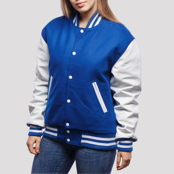 Classic royal blue wool letterman jacket with white leather sleeves, showcasing timeless varsity style.