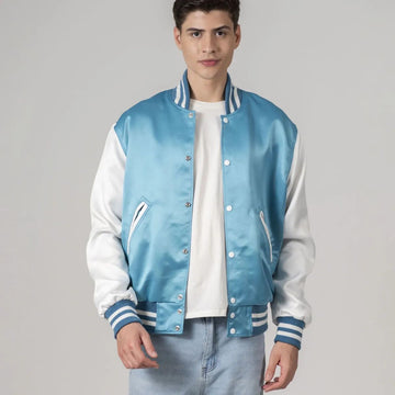 Modern blue satin varsity jacket with white sleeves and trim, featuring a stylish and contemporary design