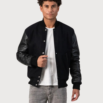 Premium black wool varsity jacket with leather sleeves, featuring a classic style and modern fit for a timeless look.