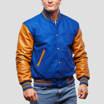 Royal blue wool letterman jacket featuring luxurious gold leather sleeves, blending classic style with modern flair