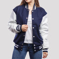 Women's letterman jacket in royal blue wool with sleek white leather sleeves, perfect for a sporty and stylish look
