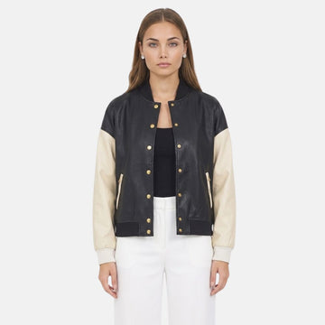 Women’s black and beige leather varsity jacket with snap button front