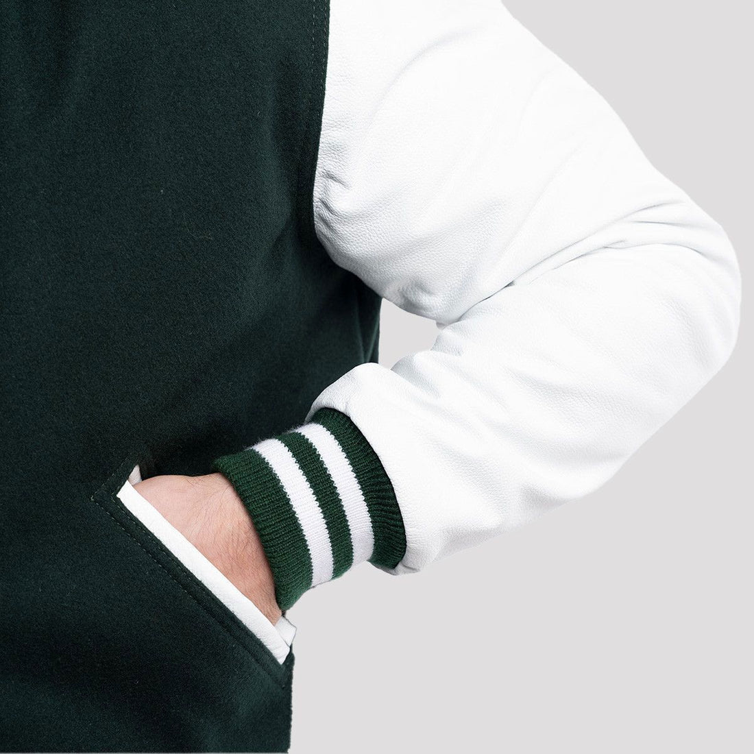 Premium fit Dartmouth green wool letterman jacket with white leather sleeves, offering a classic varsity style