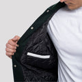 Stylish Dartmouth green wool letterman jacket featuring white leather sleeves, tailored for a sleek fit