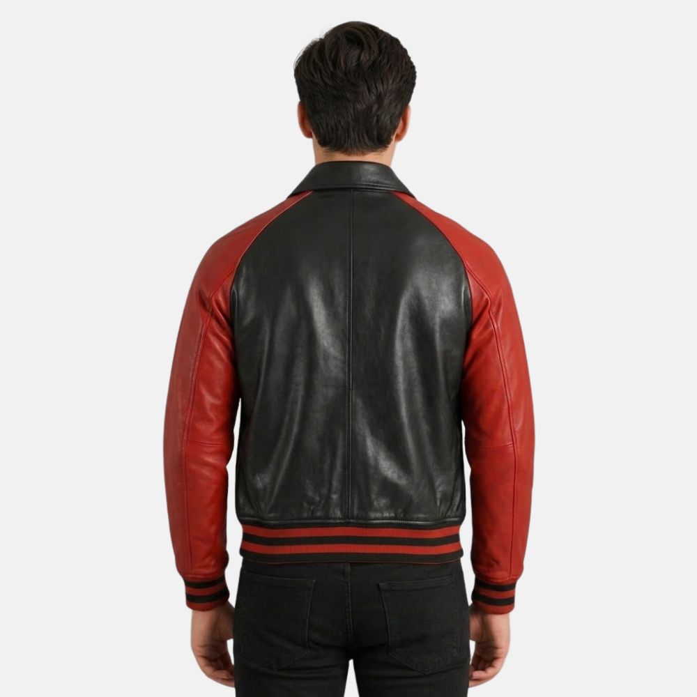 Black and red leather jacket worn by a person on a white background