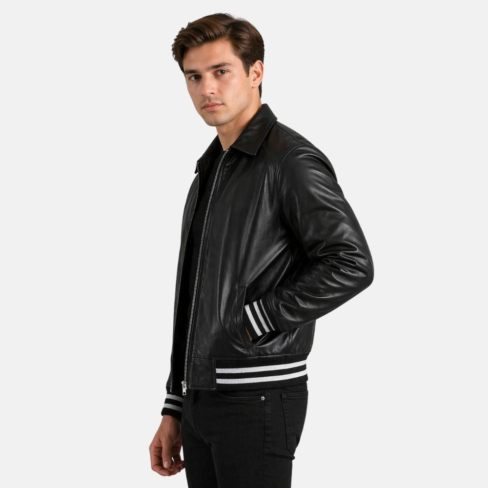 Man wearing a black leather jacket with white stripes on a white background