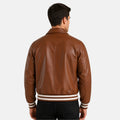 Man wearing a brown leather jacket on a white background