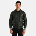 Man wearing a black leather jacket with white stripes on a gray background