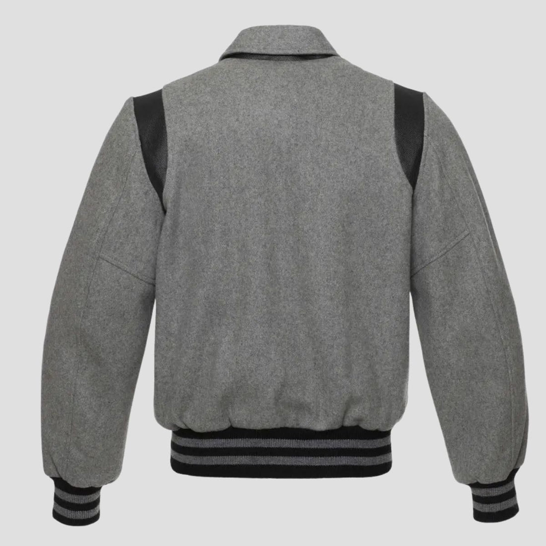 A grey wool letterman-style jacket with black leather sleeves and rib-knit trim on the collar, cuffs, and hem, featuring a snap button closure.