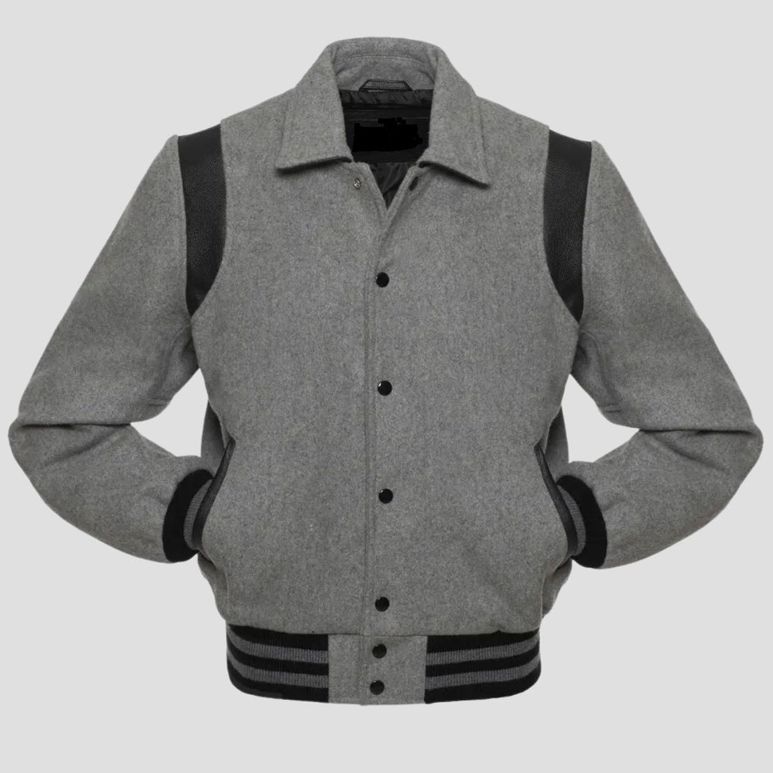 A grey wool letterman-style jacket with black leather sleeves and rib-knit trim on the collar, cuffs, and hem, featuring a snap button closure.