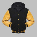 Black and yellow varsity jacket with a hood on a gray background