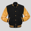 Black gold wool and vinyl varsity jacket for men with yellow sleeves, snap buttons, striped rib cuffs, and classic letterman style.