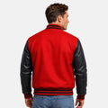 Man wearing a red varsity jacket with black sleeves on a white background
