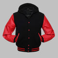 Black and red varsity jacket with leather sleeves on a gray background