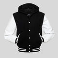 Black and white varsity jacket with a hood on a gray background
