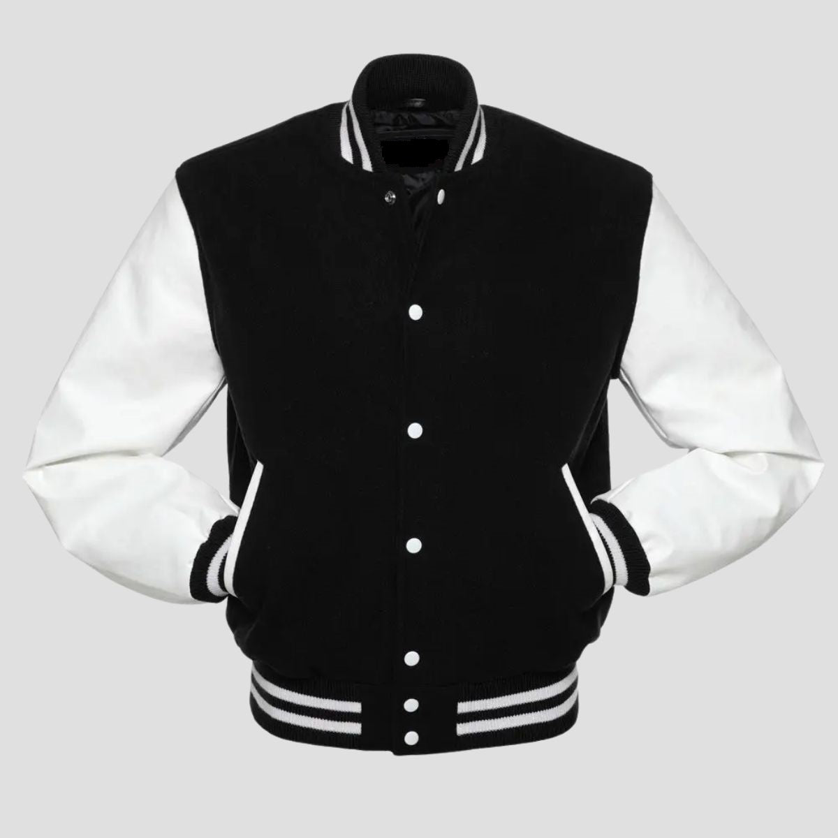 A classic men's varsity jacket with a black wool body and white vinyl sleeves, featuring a traditional snap button closure, rib-knit trim on the collar, cuffs, and waistband, and designed in a black and white color scheme.
