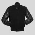 Black jacket with leather sleeves on a gray background