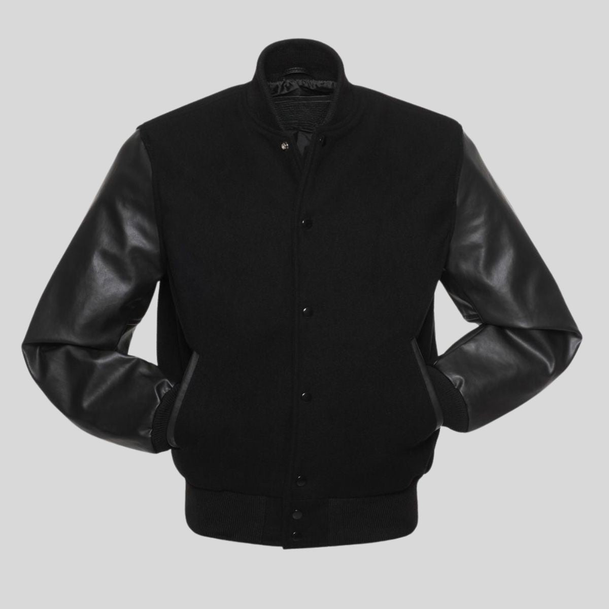 Black jacket with leather sleeves on a gray background