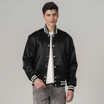 Classic black satin letterman jacket with white striped trims, offering a sleek and stylish varsity look