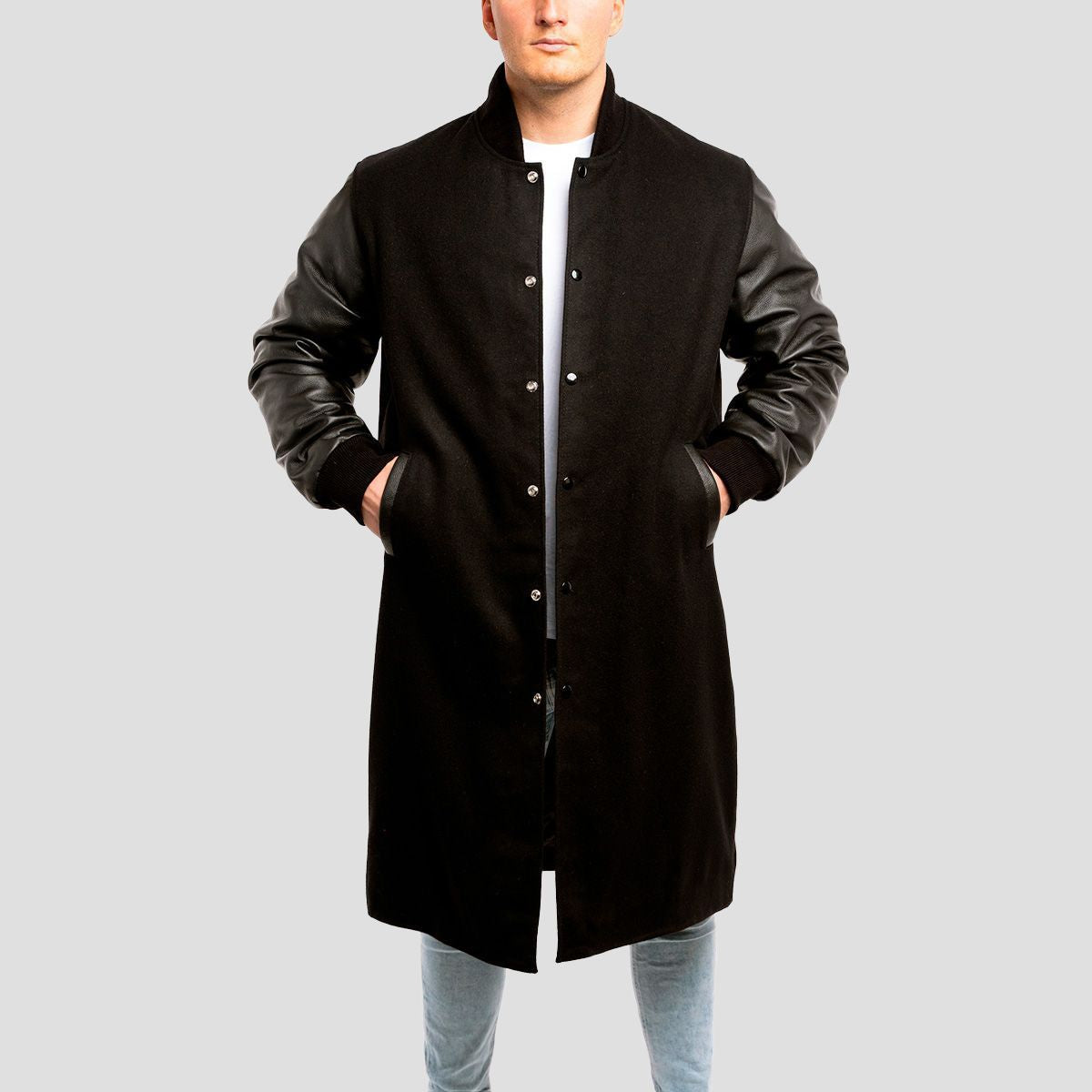 Stylish black varsity jacket with wool body and black leather sleeves