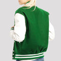 Stylish varsity jacket featuring Kelly green wool and white leather sleeves