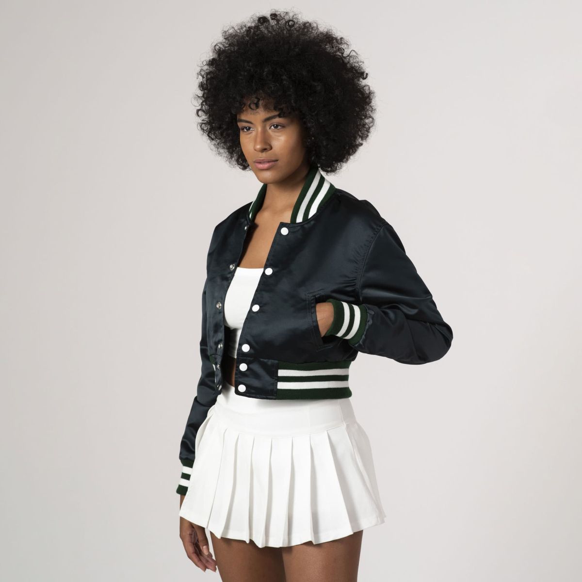 Satin varsity jacket in Dartmouth green with cropped cut, perfect for a sleek and modern style