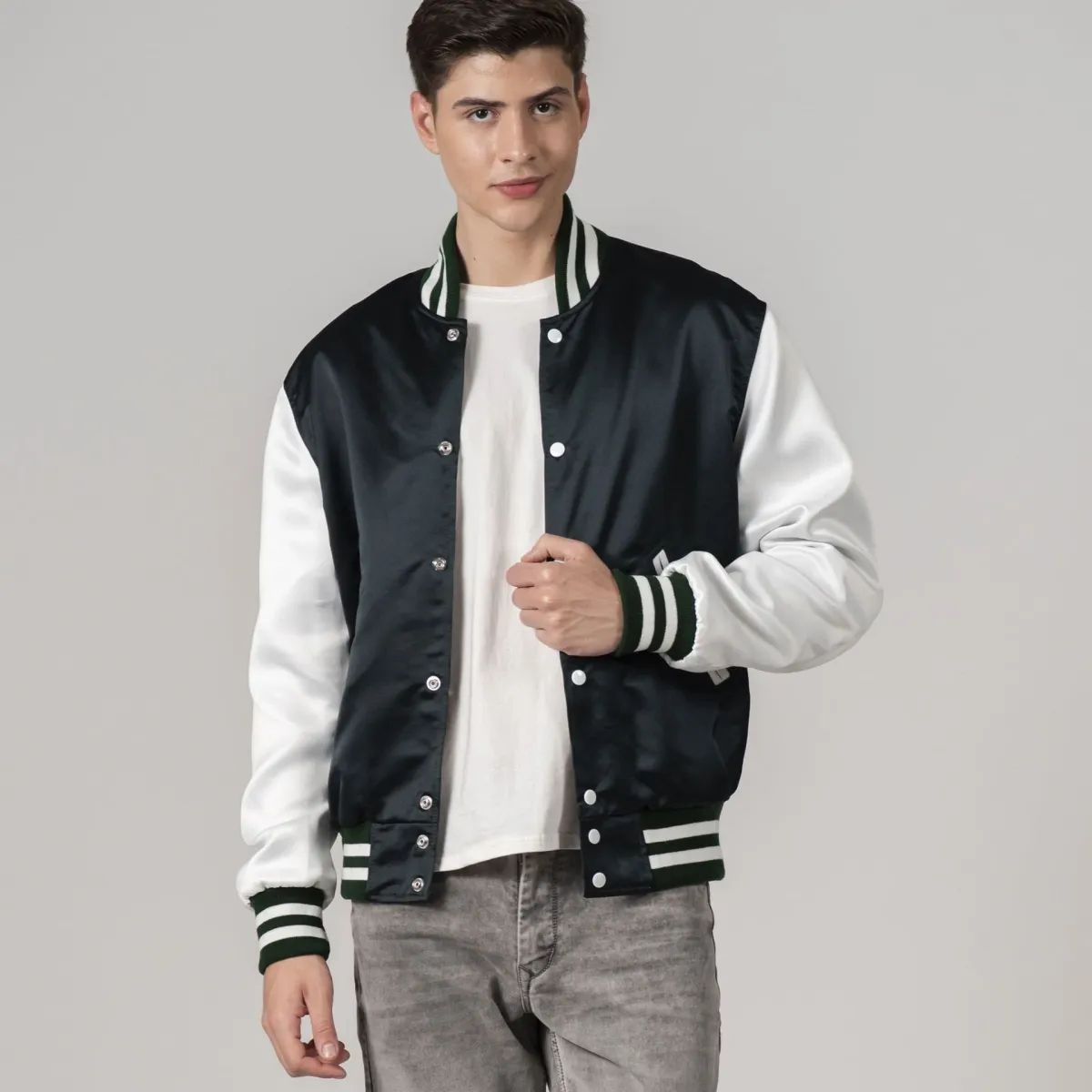 Men's varsity jacket in forest green satin with contrasting white sleeves, ideal for casual streetwear