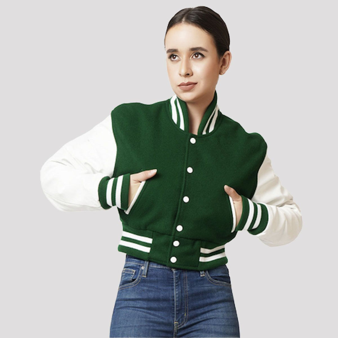 Kelly green crop top varsity jacket with bold white sleeves, offering a trendy and sporty look