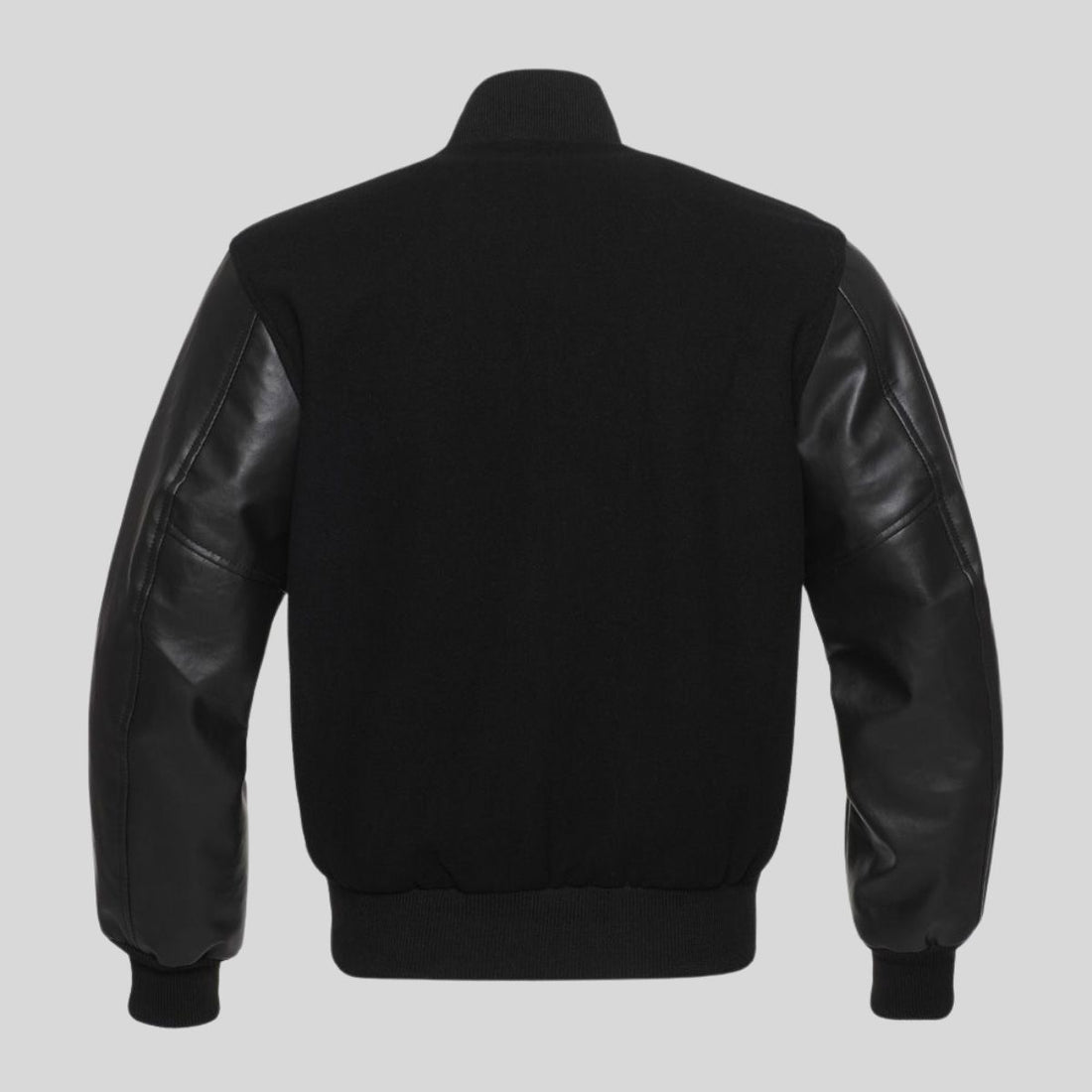 Black jacket with leather sleeves on a gray background