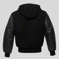 Black hoodie with leather sleeves on a light gray background