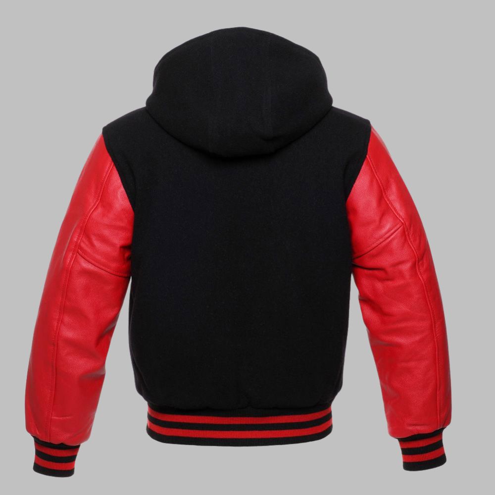 Black and red varsity jacket with leather sleeves on a gray background