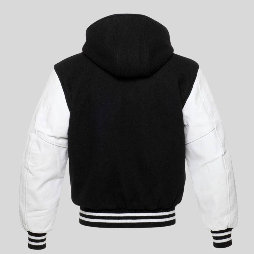 Black and white varsity jacket with a hood on a gray background