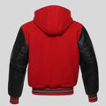 Red hooded jacket with black leather sleeves on a gray background