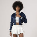 Trendy navy blue crop top varsity jacket in satin, offering a chic look for sporty streetwear