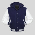 Navy blue and white varsity jacket on a gray background