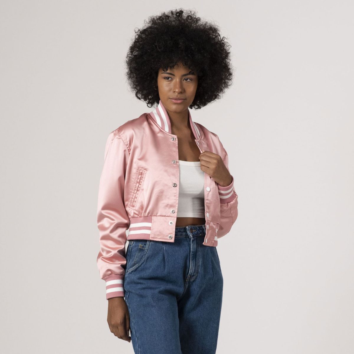 Pink satin crop top varsity jacket featuring a stylish design, perfect for a chic, sporty look