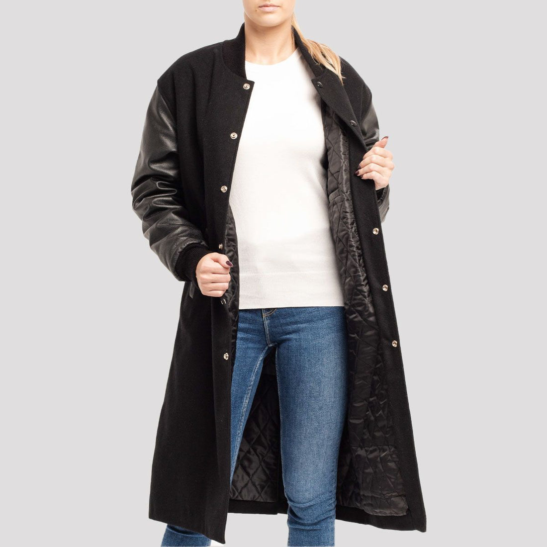 Premium black wool varsity coat with leather sleeves, combining classic style with modern sophistication