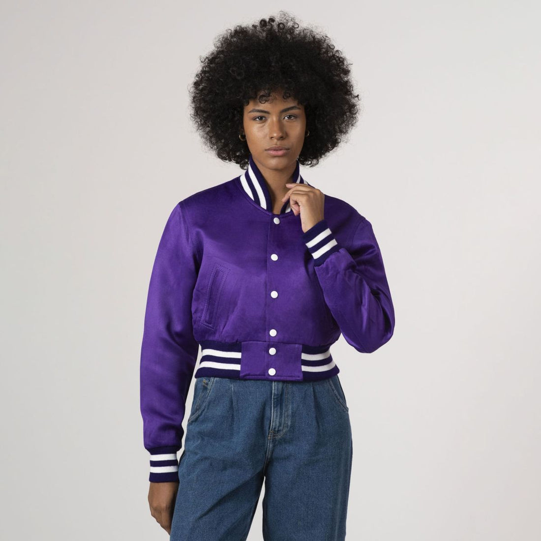 Purple satin crop top varsity jacket with a trendy design, perfect for a stylish and sporty look