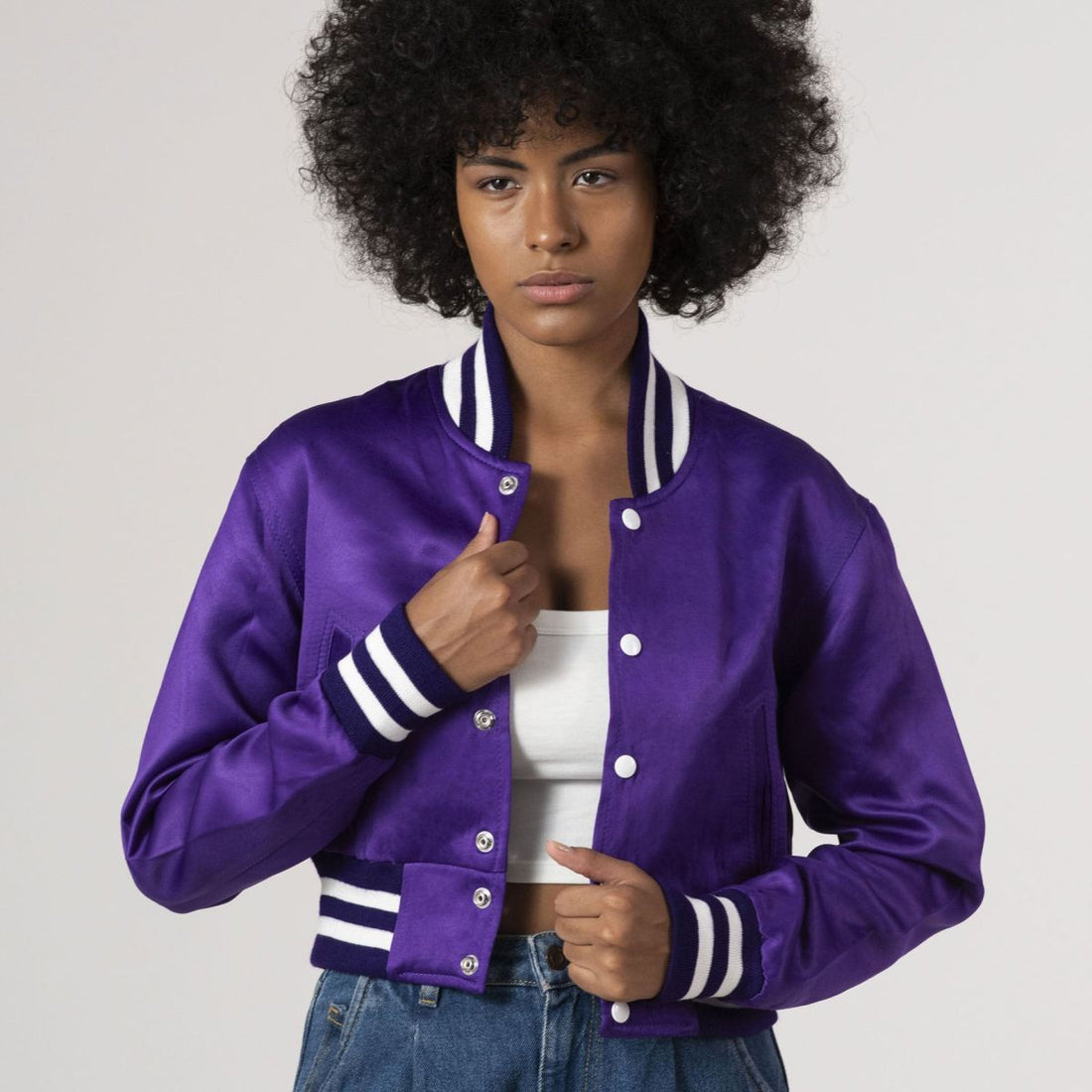 Purple satin crop top varsity jacket with a trendy design, perfect for a stylish and sporty look