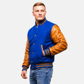 Man wearing a blue and brown varsity jacket on a white background