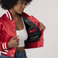 Chic scarlet red satin varsity jacket with a cropped silhouette, great for layering with casual attire