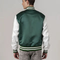 Kelly green white letterman bomber jacket for men styled with casual jeans